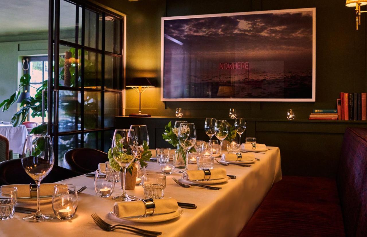 فندق ميتري كنغستون أبون تامْسْ المظهر الخارجي الصورة The interior of the restaurant