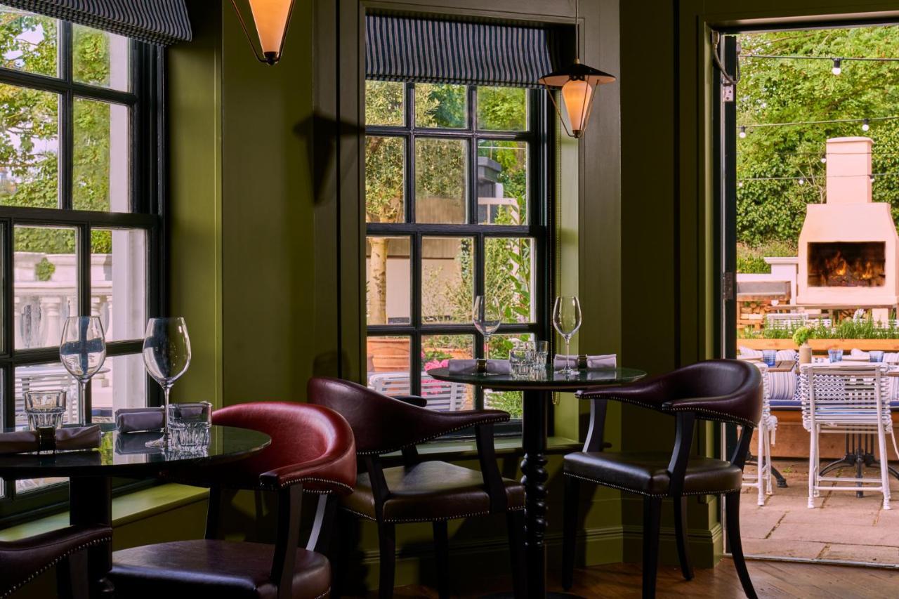 فندق ميتري كنغستون أبون تامْسْ المظهر الخارجي الصورة The interior of the restaurant